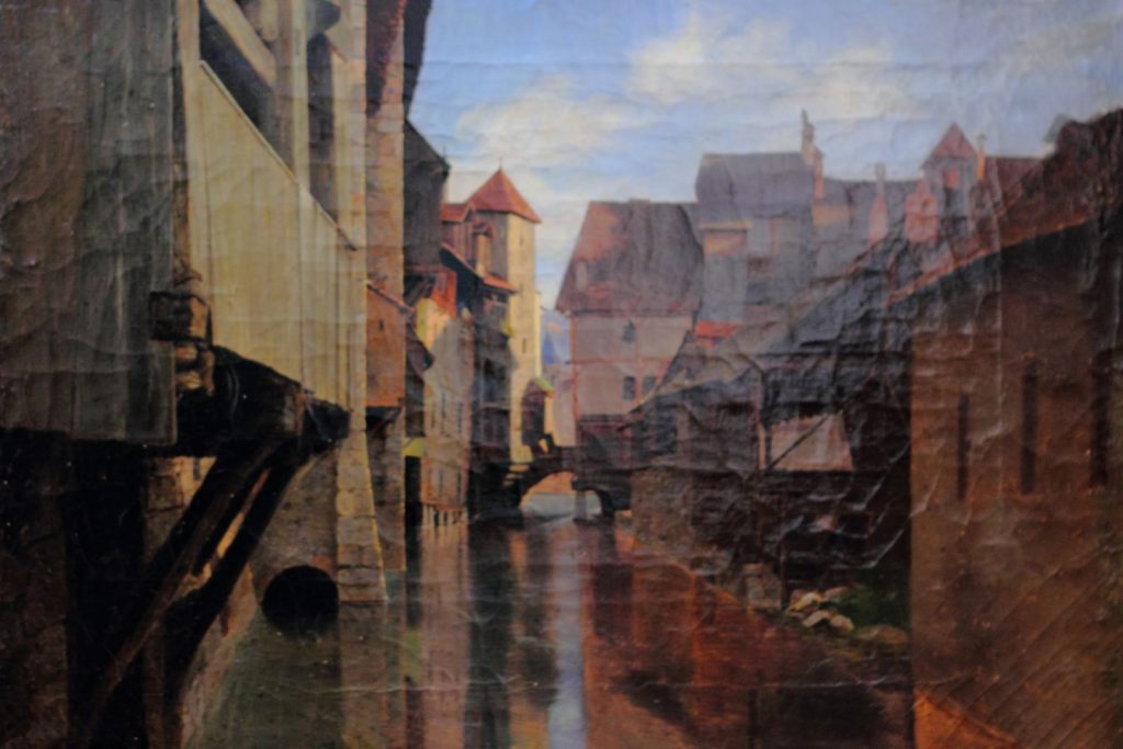 Tableau de Paul Cabaud montrant le pont Morens à Annecy couvert des maisons du château branlant, au-dessus du Thiou